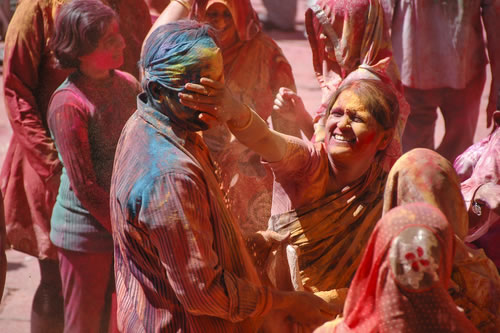 Holi, a Hindu and Sikh spring religious festival celebrated by throwing colored powder at others