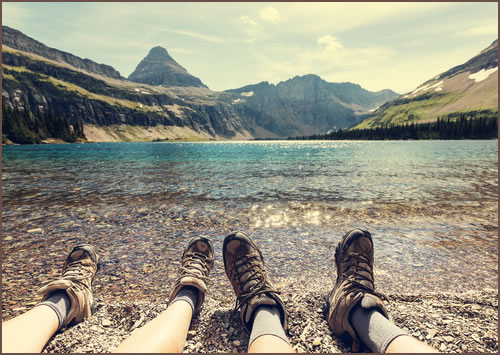 Hiders feet by mountains lake...