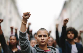 Youn people protesting in the street