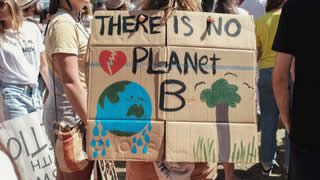 A sign that reads There is no planet B.