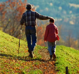 Man and boy walking