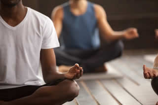 Men meditating