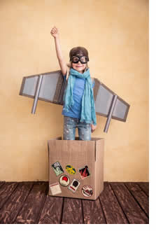 Kid as plane out of box