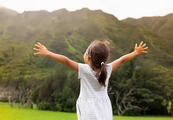 Little girl with outstreched arms