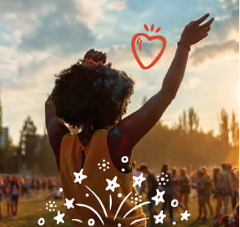 Young girl in a field of people with images of heart over her head.